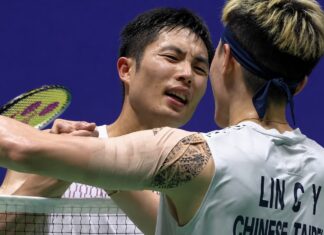 Chou Tien Chen shakes hands with Lin Chun-Yi after defeating his compatriot in the 2026 China Open badminton semifinals. (Photo: AFP)
