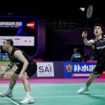 Aaron Chia and Soh Wooi Yik advance to the quarterfinals of the 2026 BWF World Championships, moving within one victory of securing another World Championships medal. (Photo: AFP)