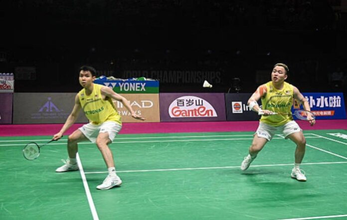 Aaron Chia-Soh Wooi Yik Permanent Reunion Decision to Come After Asian Games. (Photo: AFP)