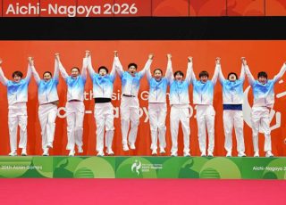 Team China gold medalists celebrate at the medal ceremony for the Badminton Women's Team Final at the Asian Games Aichi-Nagoya 2026. (Photo: China News Service)