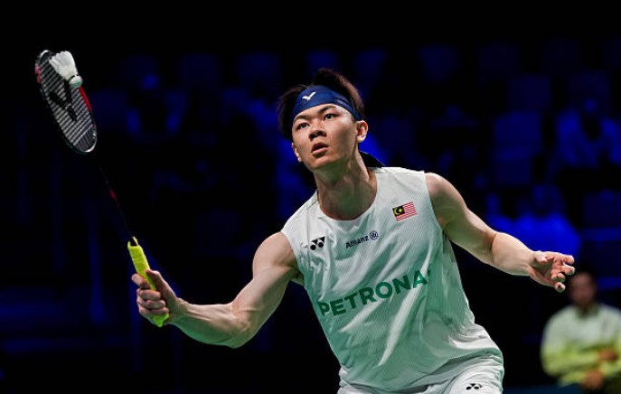 Malaysia’s Lee Zii Jia turns his attention back to badminton amid an ongoing family court case as he prepares for a possible return at the 2026 HYLO Open. (Photo: AFP)