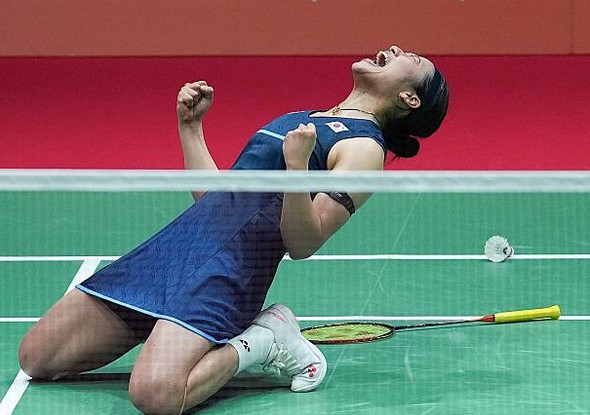 An Se Young celebrates her 2026 Aichi-Nagoya Asian Games women’s singles gold medal after beating Akane Yamaguchi, with the Korean star now setting her sights on achievements inspired by Lin Dan. (Photo: AFP)