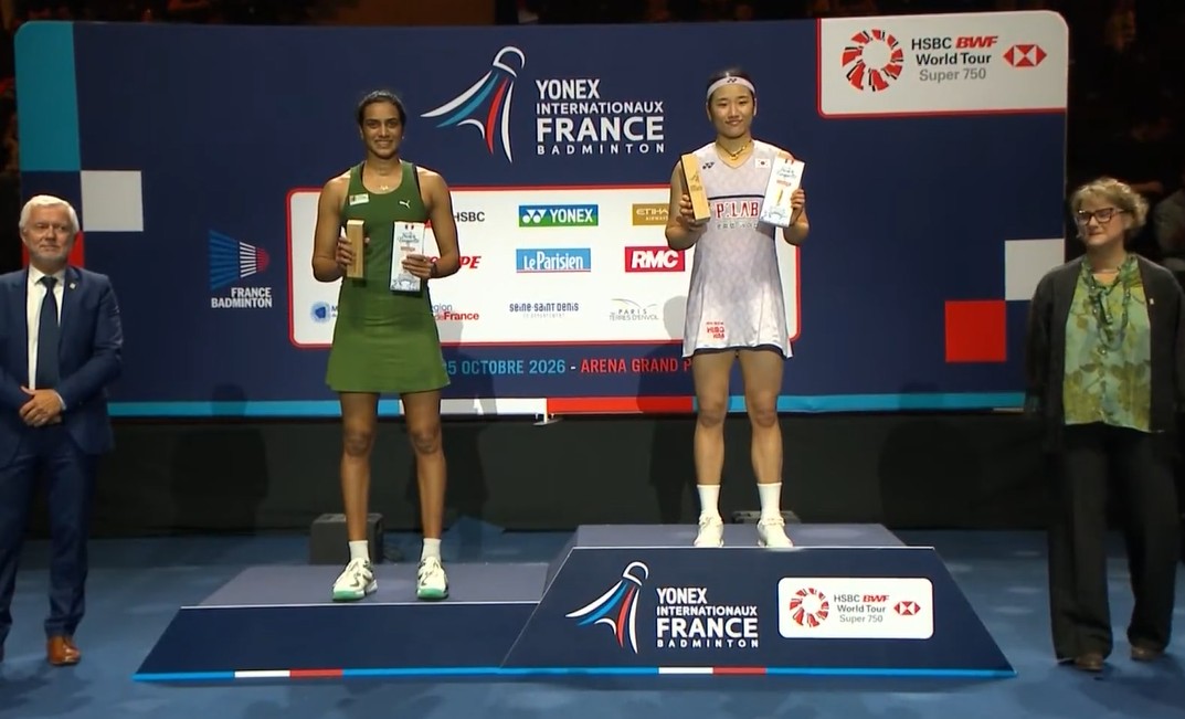 South Korea's An Se Young poses for a photo with India's P. V. Sindhu during the awards ceremony at the 2026 French Open, after defeating Sindhu 16-21, 21-11, 21-12 to claim the women's singles title in Paris. (Photo: BWF)