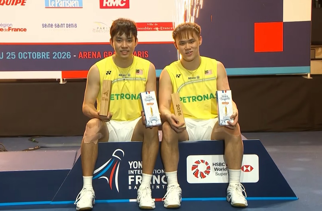 Malaysia's Man Wei Chong and Tee Kai Wun celebrate their 2026 French Open men's doubles championship after defeating compatriots Goh Sze Fei and Nur Izzuddin 13-21, 21-15, 21-7 in the final in Paris. (Photo: BWF)