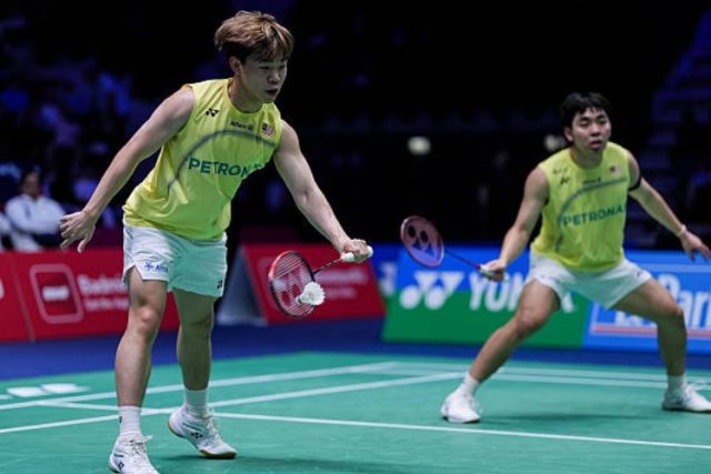 Malaysia's Aaron Tai and Yap Roy King celebrate their 22-20, 21-19 victory over Indonesia's Sabar Karyaman Gutama and Moh Reza Pahlevi Isfahani in the second round of the 2026 HYLO Open in Saarbrücken, Germany. (Photo: AFP)