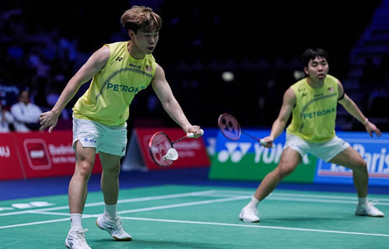 Malaysia's Aaron Tai and Yap Roy King celebrate their 22-20, 21-19 victory over Indonesia's Sabar Karyaman Gutama and Moh Reza Pahlevi Isfahani in the second round of the 2026 HYLO Open in Saarbrücken, Germany. (Photo: AFP)